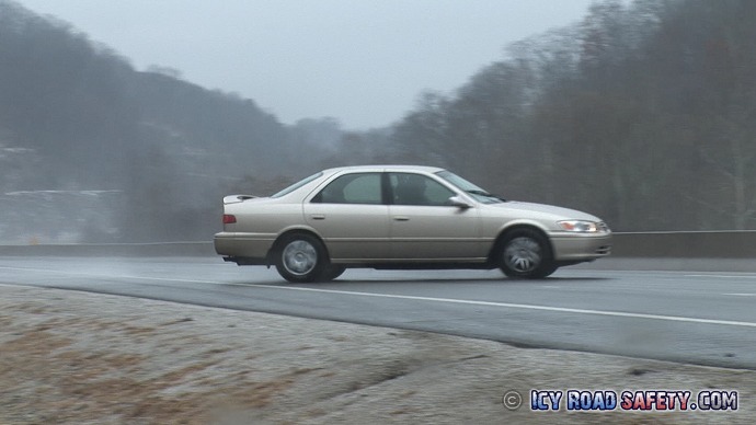 Car spins out on black ice