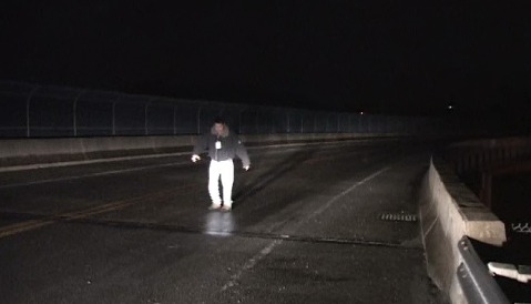 Dan checking the surface of an icy bridge