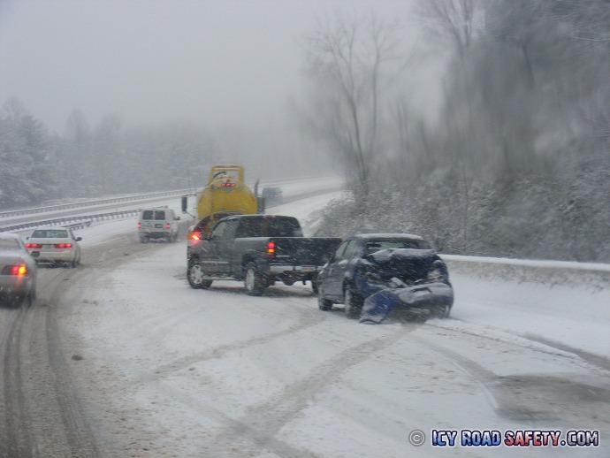 Accident aftermath on snow-covered interstate