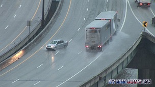 Spinout and near miss on icy bridge