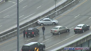 Collision aftermath on icy bridge